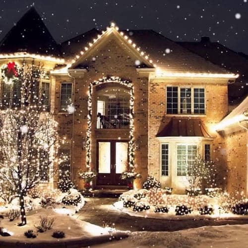 Ben Langstaff, founder of Classic Christmas Lighting, with his team installing holiday lights